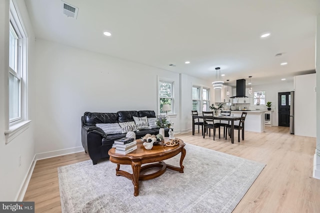 3814 Cedardale Rd, Baltimore, MD 21215 - living room featuring light wood-type flooring and recessed lighting