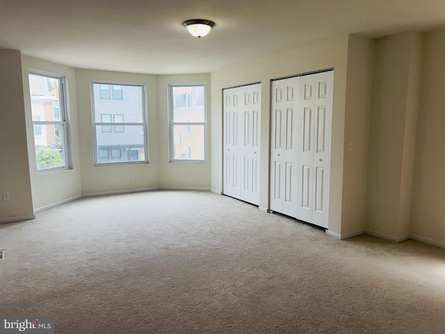 115 W Sharpnack St, Philadelphia, PA 19119 - unfurnished bedroom featuring carpet and multiple closets