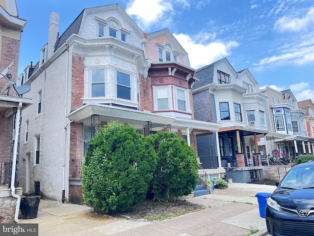 115 W Sharpnack St, Philadelphia, PA 19119 - view of front of house with brick siding and a residential view