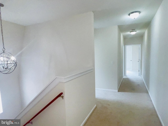 115 W Sharpnack St, Philadelphia, PA 19119 - hall featuring an upstairs landing, a chandelier, and light carpet