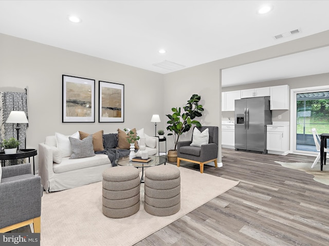 813 Ferguson Rd, Joppa, MD 21085 - living area featuring light wood-type flooring and recessed lighting