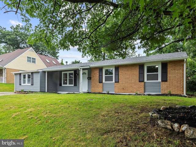 813 Ferguson Rd, Joppa, MD 21085 - view of front of house with brick siding and a front yard