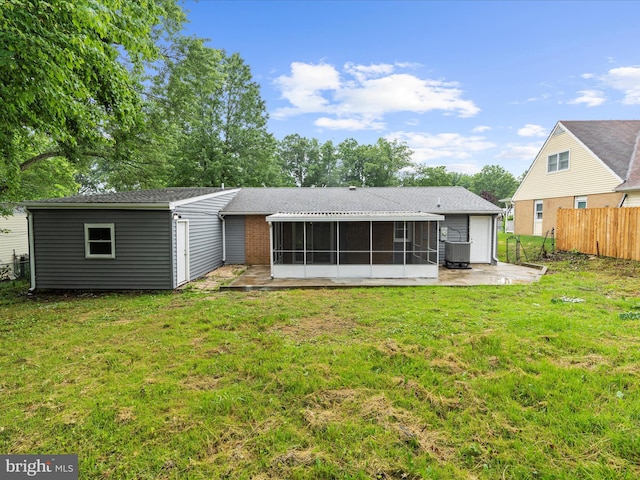 813 Ferguson Rd, Joppa, MD 21085 - rear view of property with a sunroom and a patio