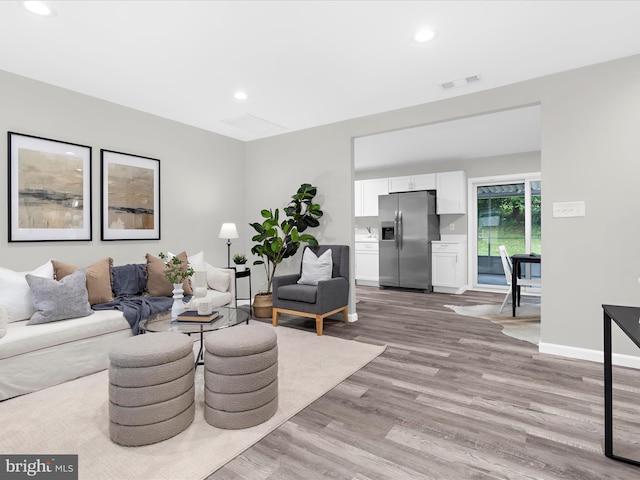 813 Ferguson Rd, Joppa, MD 21085 - living room featuring wood finished floors and recessed lighting