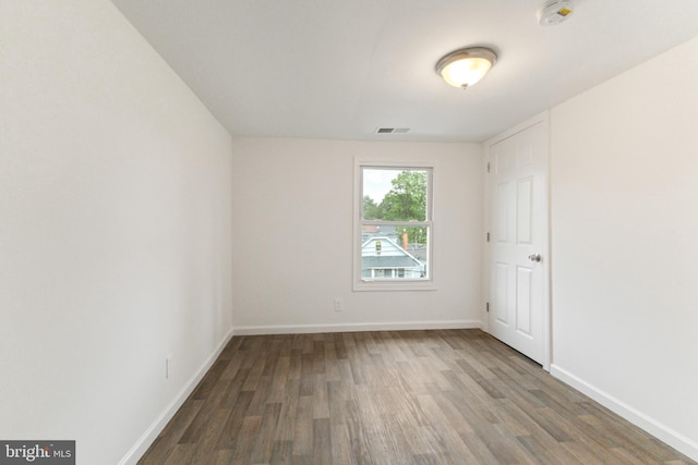 211 Broad St, Beverly, NJ 08010 - unfurnished room featuring a smoke detector and wood finished floors