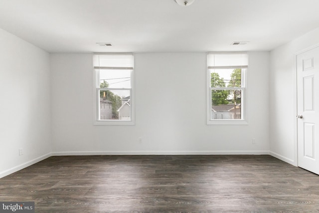 211 Broad St, Beverly, NJ 08010 - spare room with wood finished floors
