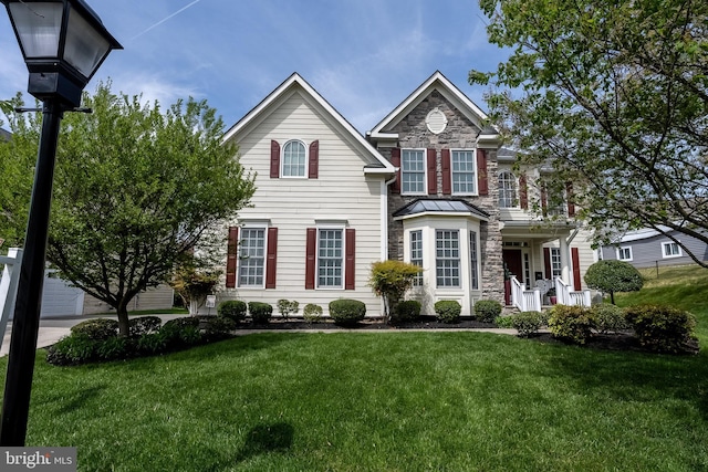 3716 Taft Ave, Alexandria, VA 22304 - traditional home with a front lawn and stone siding