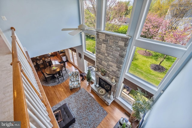 3716 Taft Ave, Alexandria, VA 22304 - living area with a ceiling fan, wood finished floors, a fireplace, and a high ceiling