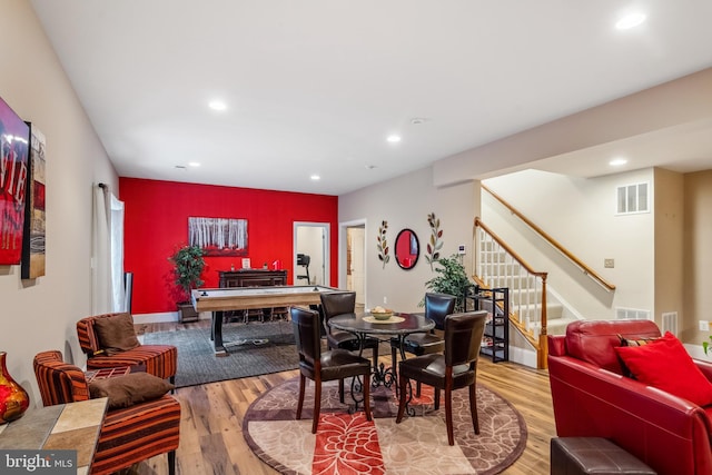 3716 Taft Ave, Alexandria, VA 22304 - dining room with recessed lighting, wood finished floors, and stairway