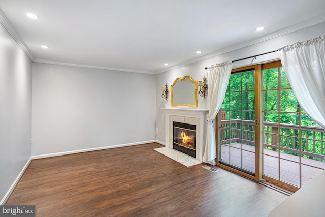 1651 Hugo Cir, Silver Spring, MD 20906 - unfurnished living room featuring crown molding, wood finished floors, a fireplace, and recessed lighting