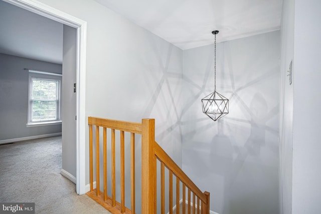 1651 Hugo Cir, Silver Spring, MD 20906 - hall with an upstairs landing, carpet floors, and a chandelier