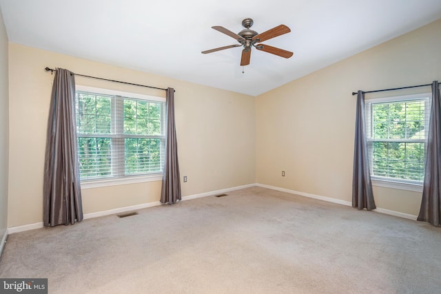1651 Hugo Cir, Silver Spring, MD 20906 - unfurnished room featuring plenty of natural light, light carpet, a ceiling fan, and lofted ceiling