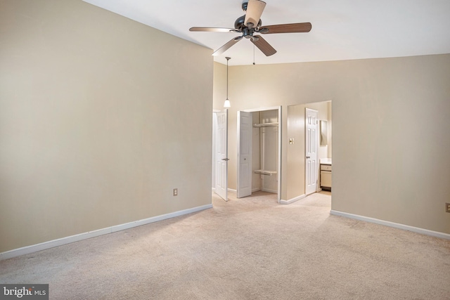 1651 Hugo Cir, Silver Spring, MD 20906 - unfurnished bedroom with light colored carpet, vaulted ceiling, ensuite bath, and a ceiling fan