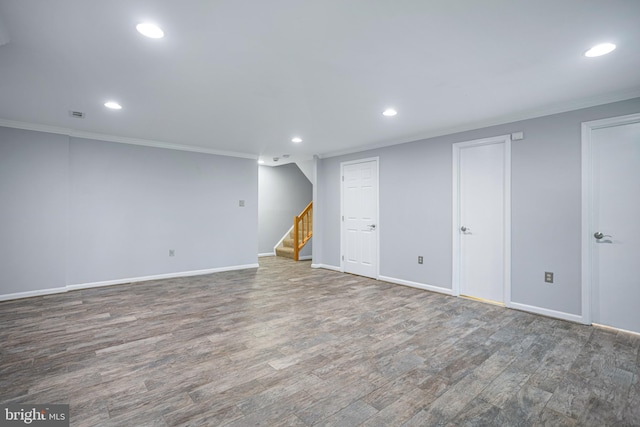 1651 Hugo Cir, Silver Spring, MD 20906 - finished basement featuring recessed lighting, ornamental molding, stairway, and wood finished floors