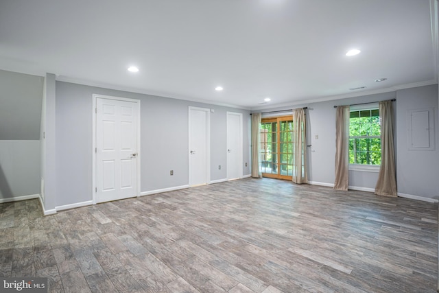 1651 Hugo Cir, Silver Spring, MD 20906 - unfurnished living room with crown molding, wood finished floors, and recessed lighting
