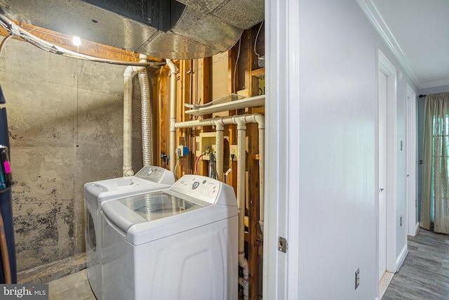 1651 Hugo Cir, Silver Spring, MD 20906 - washroom with washing machine and clothes dryer and ornamental molding