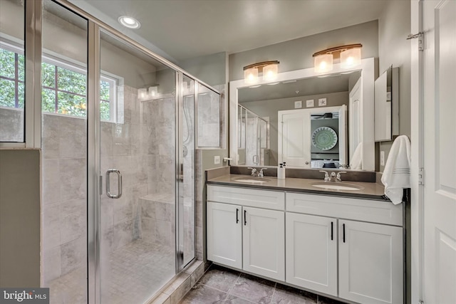 2596 Twin Birch Rd, Hanover, MD 21076 - bathroom featuring double vanity, a shower stall, and recessed lighting