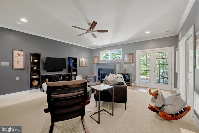 2596 Twin Birch Rd, Hanover, MD 21076 - living area featuring recessed lighting, crown molding, a ceiling fan, a glass covered fireplace, and carpet floors