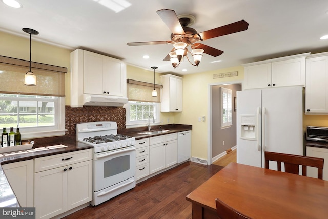 9 Morningside Dr, Pennington, NJ 08534 - kitchen with white appliances, under cabinet range hood, a ceiling fan, dark countertops, and dark wood finished floors
