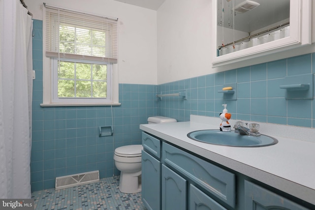 9 Morningside Dr, Pennington, NJ 08534 - full bathroom featuring vanity, tile patterned flooring, wainscoting, tile walls, and curtained shower