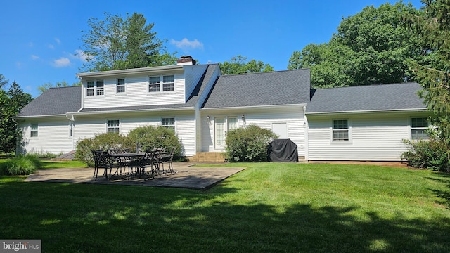 9 Morningside Dr, Pennington, NJ 08534 - back of property featuring a patio, a lawn, a chimney, and a shingled roof