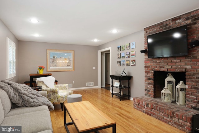 9 Morningside Dr, Pennington, NJ 08534 - living area featuring wood finished floors, recessed lighting, and a fireplace