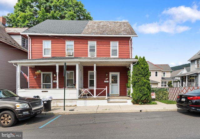 107 B St, Pen Argyl, PA 18072 - townhome / multi-family property featuring a porch and cooling unit