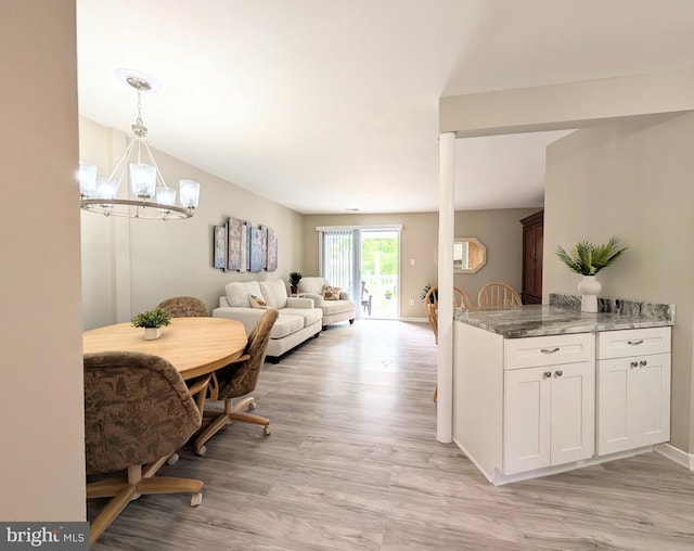 532 Sunrise Ave, Harbour View, Somers Point, NJ 08244 - dining space with a chandelier and light wood-style floors