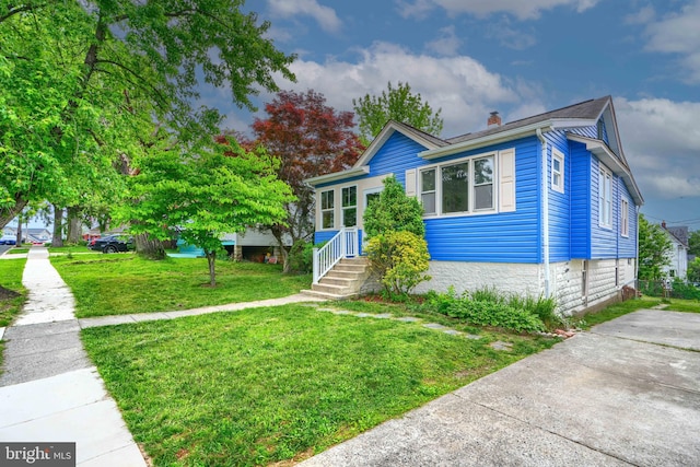 2721 Louise Ave, Baltimore, MD 21214 - bungalow-style home with a chimney and a front lawn