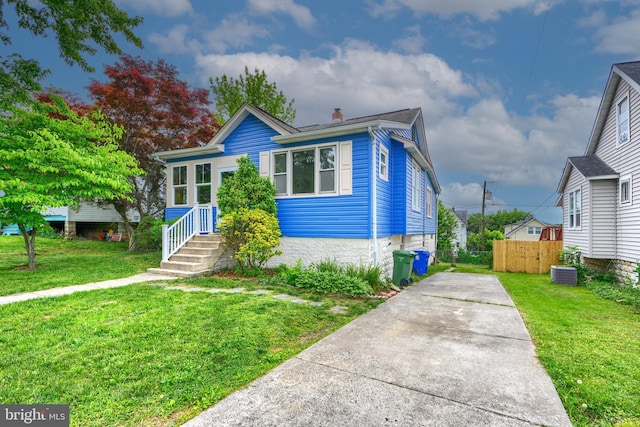 2721 Louise Ave, Baltimore, MD 21214 - bungalow featuring driveway and a chimney