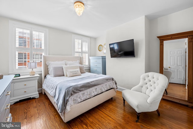307 S Exeter St, Baltimore, MD 21202 - bedroom with dark wood-style flooring