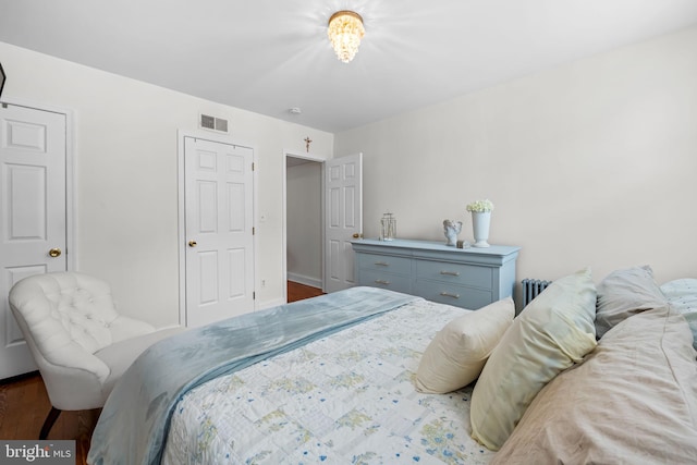 307 S Exeter St, Baltimore, MD 21202 - bedroom featuring wood finished floors