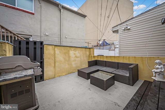 307 S Exeter St, Baltimore, MD 21202 - view of patio featuring grilling area and an outdoor living space