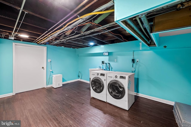 307 S Exeter St, Baltimore, MD 21202 - washroom with washing machine and clothes dryer and wood finished floors