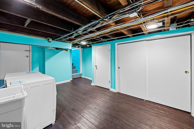 307 S Exeter St, Baltimore, MD 21202 - finished basement with washing machine and clothes dryer, dark wood-style floors, and stairway