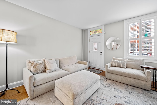 307 S Exeter St, Baltimore, MD 21202 - living room with wood finished floors and baseboards