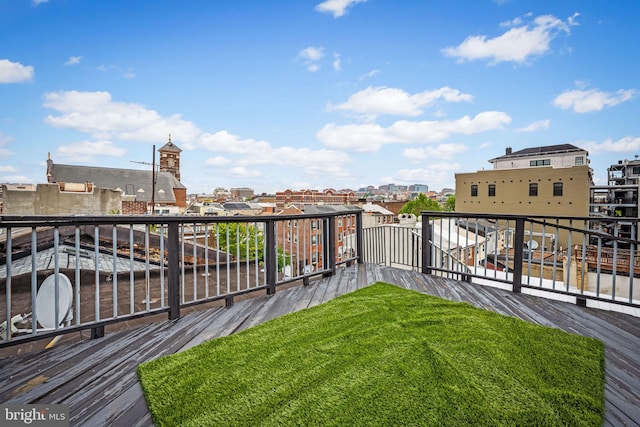 307 S Exeter St, Baltimore, MD 21202 - view of green lawn with a balcony and a view of city