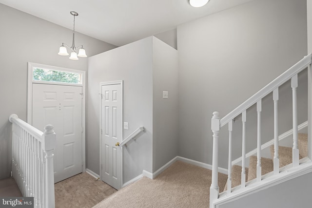 21024 Mossy Glen Ter, Ashburn, VA 20147 - carpeted entrance foyer featuring a chandelier and vaulted ceiling