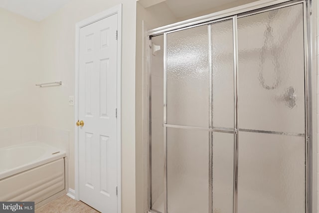 21024 Mossy Glen Ter, Ashburn, VA 20147 - bathroom featuring a stall shower and a bath
