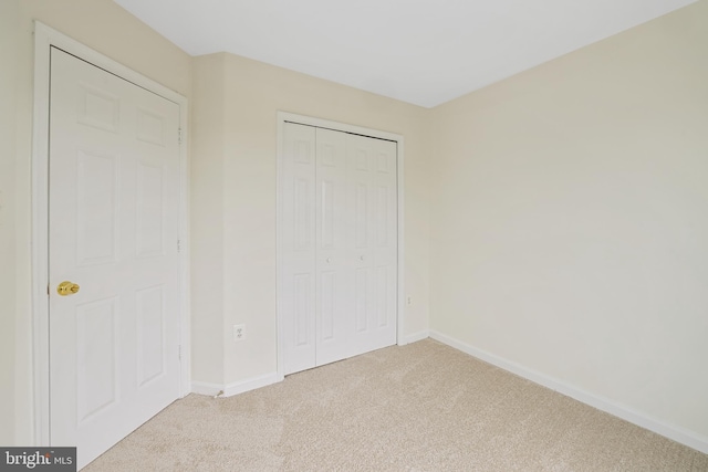 21024 Mossy Glen Ter, Ashburn, VA 20147 - unfurnished bedroom with carpet floors and a closet