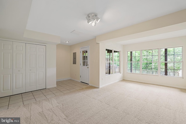 21024 Mossy Glen Ter, Ashburn, VA 20147 - unfurnished bedroom featuring electric panel, carpet, tile patterned flooring, and a closet