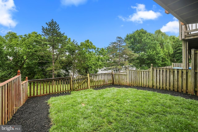 21024 Mossy Glen Ter, Ashburn, VA 20147 - fenced backyard with view of scattered trees
