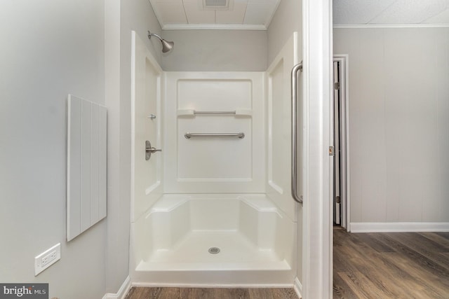 324 N 2nd St, Lykens, PA 17048 - full bath featuring wood finished floors, a shower, and crown molding
