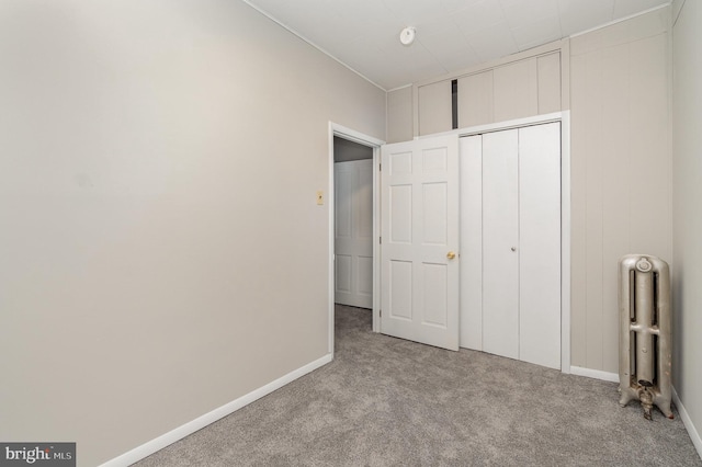 324 N 2nd St, Lykens, PA 17048 - unfurnished bedroom with carpet flooring, radiator heating unit, and a closet