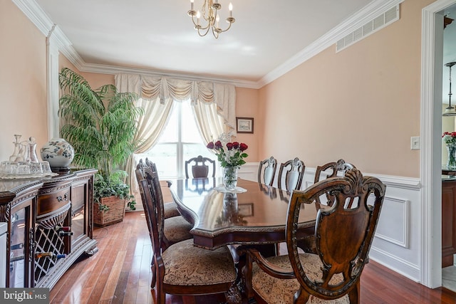 8 Cove Ct, Hainesport, NJ 08036 - dining room with a chandelier, crown molding, hardwood / wood-style floors, and wainscoting