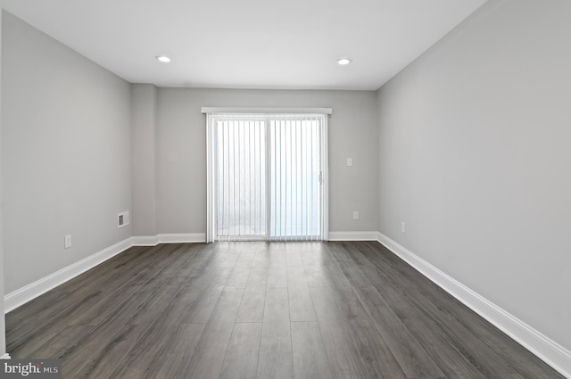 816 Carroll St, Baltimore, MD 21230 - spare room with dark wood-type flooring and recessed lighting