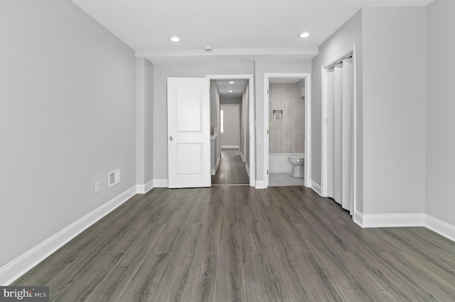 816 Carroll St, Baltimore, MD 21230 - empty room with wood finished floors and recessed lighting