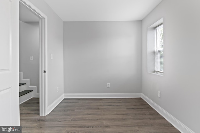816 Carroll St, Baltimore, MD 21230 - empty room with wood finished floors and baseboards