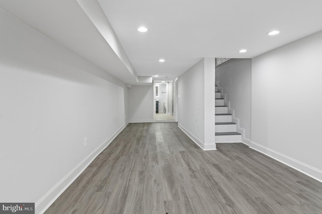 816 Carroll St, Baltimore, MD 21230 - finished below grade area with recessed lighting, stairs, and wood finished floors
