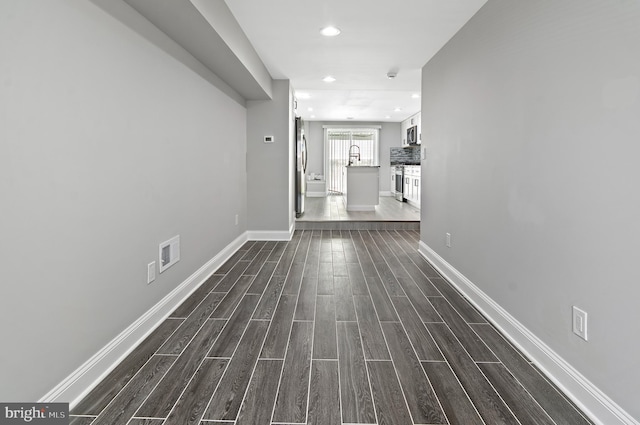 816 Carroll St, Baltimore, MD 21230 - hall featuring dark wood-type flooring and recessed lighting